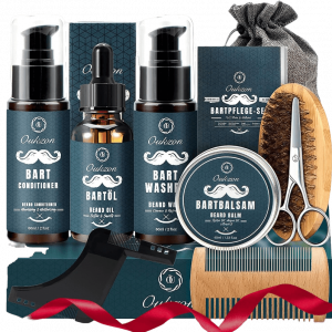 Pack de varios artículos como peine tijera cepillo barba y productos para el cuidado de la barba