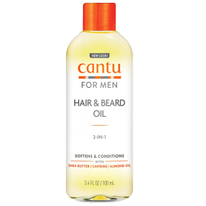 Bote conteniendo aceite para el cabello y la barba masculina de la marca Cantu