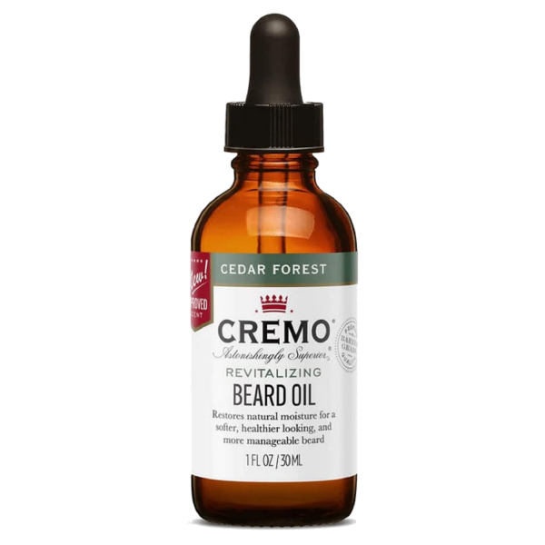 Bote con dispensador de gotas conteniendo aceite para la barba masculina. De la marca Cremo